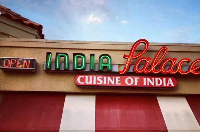 India Palace storefront sign on South Lewis Ave